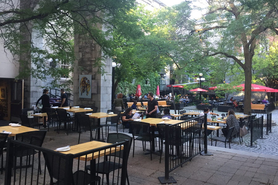 Clarendon Courtyard restaurant patios in the summer